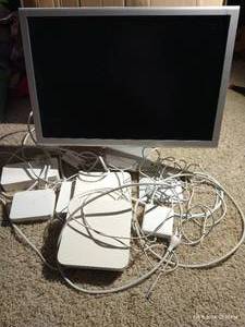 lot 36 image: Large Apple Products Lot - Monitor, Wireless Routers, Etc.