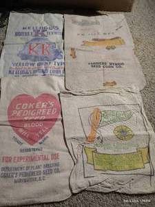 lot 58 image: (4) Vintage Seed Sacks