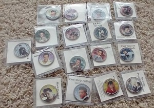 lot 90 image: (17) Elvis Presley Half Dollars