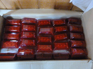 lot 73 image: Case of Lumen X LED Red Marker Lights