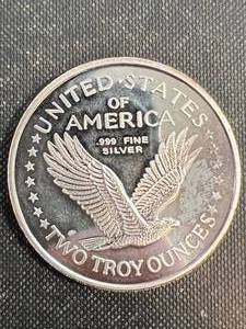 2 TROY OZ .999 FINE SILVER LIBERTY ROUND