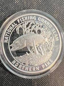 1 TROY OZ .999 FINE SILVER NORTH AMERICAN FISHING CLUB ROUND IN AIRTITE