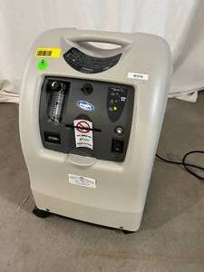 lot 7 image: MSRP $1900 Invacare Profecto2 Oxygen Concentrator WInvacare HomeFill System Port Designed To Reduce Unscheduled Maintenance Great For&nbspOxygen Bars, Spas, Torch Welding, Glass Works, Fish Farming & More - Good Working Condition