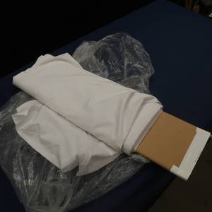 lot 5 image: BOLT OF WHITE FABRIC
