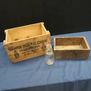 lot 77 image: CHAMPION SPARK PLUG COMPANY BOX, VINTAGE MILK GLASS, WOODEN AMMO BOX