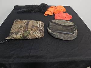 lot 10 image: Stearns Dry Wear Pack Including Raincoat and Pants, Orange Hunting Hat and Band, Black Fur Collar