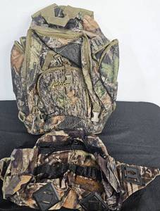 lot 11 image: Fieldline Camouflage Back and Waist Packs, Mossy Oak Camouflage Gloves, Stearns Black Gloves & Thinsulate Orange Gloves