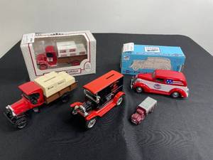 lot 73 image: VTG Replica Coin Banks of Various Sizes