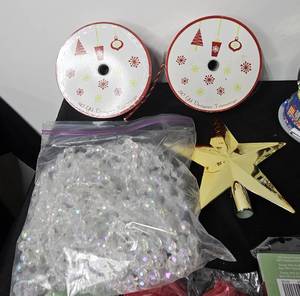 lot 150 image: 2020 New YorkBroadway Snow Globe, Star Tree Topper, 4 Packs of Red Pull Bows, 2 Packs of Silver Fan Bows & 1 Pack of a Gold Fan Bow