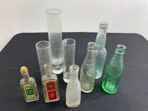 lot 173 image: Various VTG Glass Bottles for Vanilla, Soda, Etc