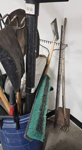 lot 200 image: Large Garbage Can Full of Brooms, Rakes, Shovels and Other Outdoor Tools
