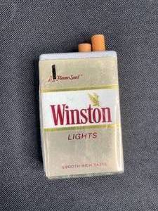 lot 249 image: 3 Camel Logo Lighters in Boxes (minus watches), 2 Winston Lighters, 2 Metal Camel Lighters