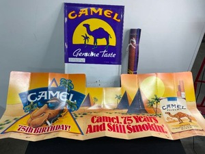 lot 260 image: Camel Logo Posters & 1 Cardboard Fold Up Type Banner