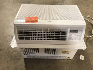 lot 26 image: LG 9,500 BTU 230V Through-the-Wall Air Conditioner LT1036CER Cools 450 Sq. Ft. with remote in White Customer Returns See Pictures