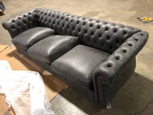 lot 28 image: Noble House Somerville 85 in. Round Arm 3-Seater Removable Cushions Sofa in Slate Missing Hardware Customer Returns See Pictures