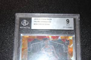 lot 54 image: 2019-20 Prizm Orange Ice Prizm Cam Reddish #256 Rookie Card BGS 9