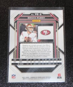 lot 75 image: 2022 Panini Prizm Black Brock Purdy #PB-8 Rookie Card