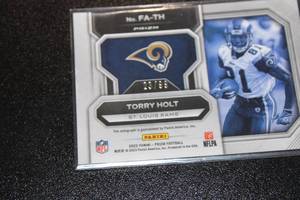 lot 98 image: 2022 Prizm Flashback Blue Ice Prizm Torry Holt Autograph #FA-TH 2399  Only 99 Exist