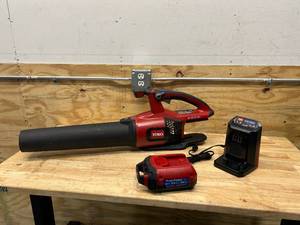 lot 21 image: TORO 60V MAX 157 mph Brushless Leaf Blower with 2.5Ah Battery and Charger