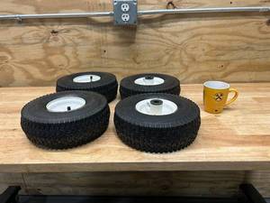 lot 64 image: Lot of 4 Tires- 4.103.50-4 Max Load 450 LBS at 30 PSI Cold