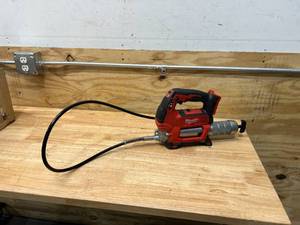 lot 8 image: MILWAUKEE M18 18V Lithium-Ion Cordless Grease Gun 2-Speed (Tool-Only)