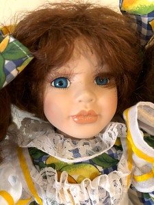 lot 76 image: Adorable Porcelain Doll