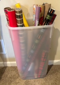lot 91 image: Wrapping Paper, Bows and Plastic Organizing Bin