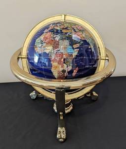 lot 27 image: Rotating Stone Inlaid Tabletop Globe