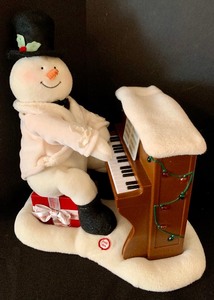 lot 111 image: Fantastic Collection of Battery Operated Animated Snowmen and One Stuffed Figurine