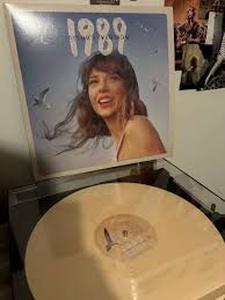 lot 77 image: Taylor Swift - 1989 (Taylors Version) Tangerine Edition-Vinyl
