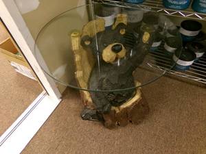 lot 53 image: Black Bear Glass Top Table...17 tall x 20 round