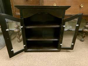lot 135 image: Black Two Door Small Cabinet  24 x 10 x 23  and Wall Shelfs