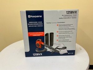 lot 7 image: Husqvarna new in box 125bvx  leaf blower