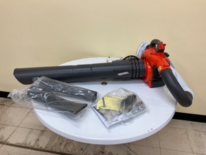 lot 10 image: Husqvarna show floor model 125bvx leaf blower