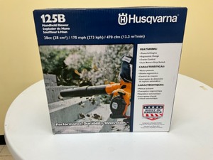 lot 11 image: Husqvarna New in box 125b Leaf Blower