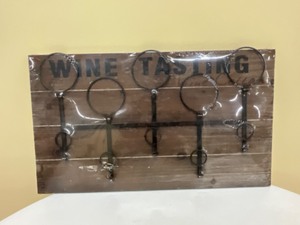lot 61 image: Decorative wall mount  wine rack