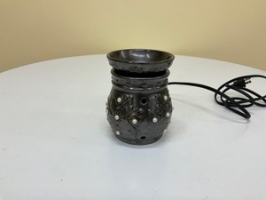 lot 80 image: Decorative plug in wax melter