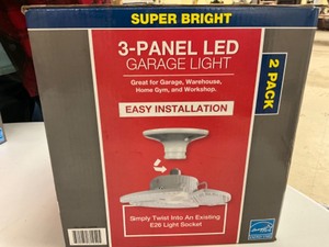 lot 117 image: Two pack tri-panel led garage light