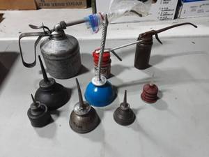 lot 8 image: Plews, Rare Rubber, Hoover, Three Eagles, Pressol Oil Cans (9 Pieces In All)