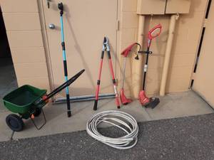 lot 77 image: Spreader, Hose, Telescoping Washer Wand, Branch Lopper, 2-Electric Weed Whackers