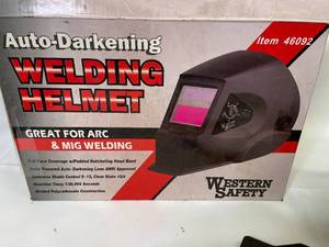 lot 103 image: Western Safety Auto-Darkening Welding Helmet Model 46092
