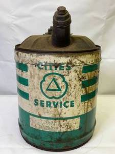 lot 140 image: Vintage Cities Service Five Gallon Oil Can with Wooden Handle
