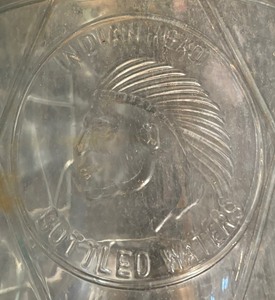 lot 237 image: Vintage Indian Head Bottled Water Glass Jug