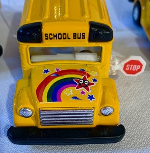 lot 197 image: Five Vintage Pull and Go Busses