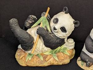 lot 29 image: Four Porcelain Panda Figurines