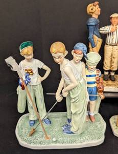 lot 56 image: Variety of Norman Rockwell Porcelain Figurines