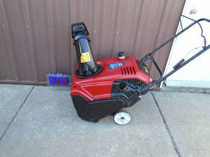 Toro 4 cycle snow thrower. Lightly used. Tested & works. As shown.
