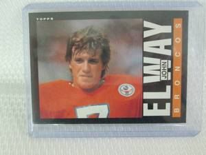 lot 44 image: 1985 Topps John Elway Card...