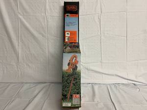 lot 35 image: Black and Decker Corded 16in Hedge Trimmer