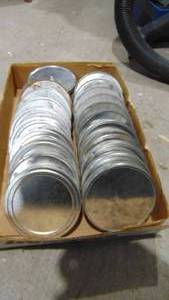 lot 105 image: Metal Film Canisters with some Plastic and Metal Reels